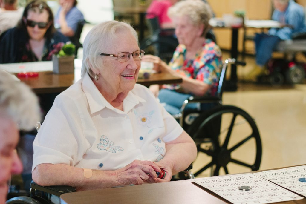 A woman enjoying an activity proved by Alcoa Pines and their respite care service
